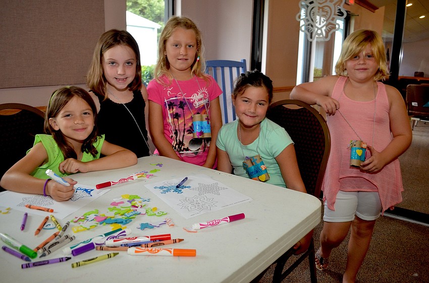 Emilie Smith, Brooke Palmtag,  Charlotte Clark, Kendall West and Sophia Sosso take a  break from coloring for a photo opp.