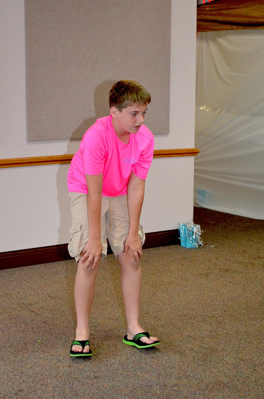 Tyler Kitchie leads a game of Simon Says.