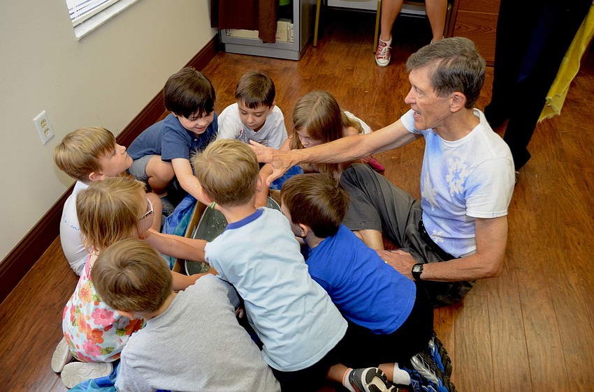 Gene Jongsma leads a water activity for campers.