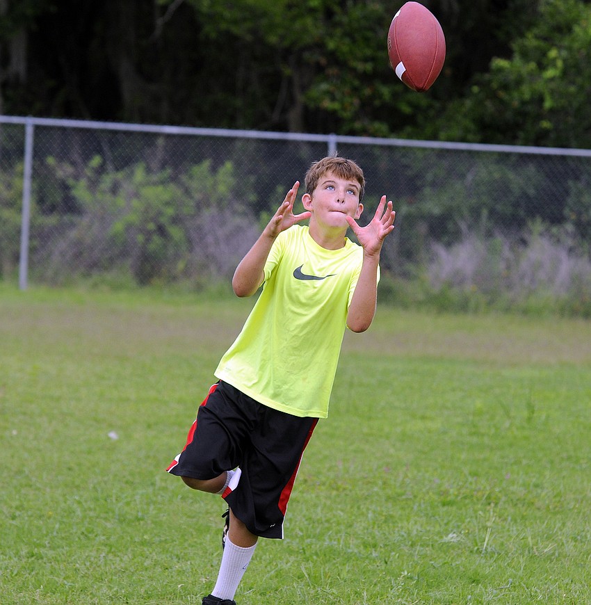 Eleven-year-old Tobias Davis attended Lakewood Ranch High’s football camp for the first time this summer.