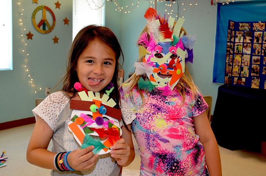 Alexa Jaime and Jaycee Heller show off their masks from Bug Day.