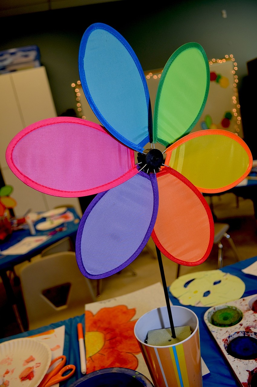 A classroom at Imagine School at Lakewodo Ranch, decorated in bright flowers and strings of white lights houses the camp.