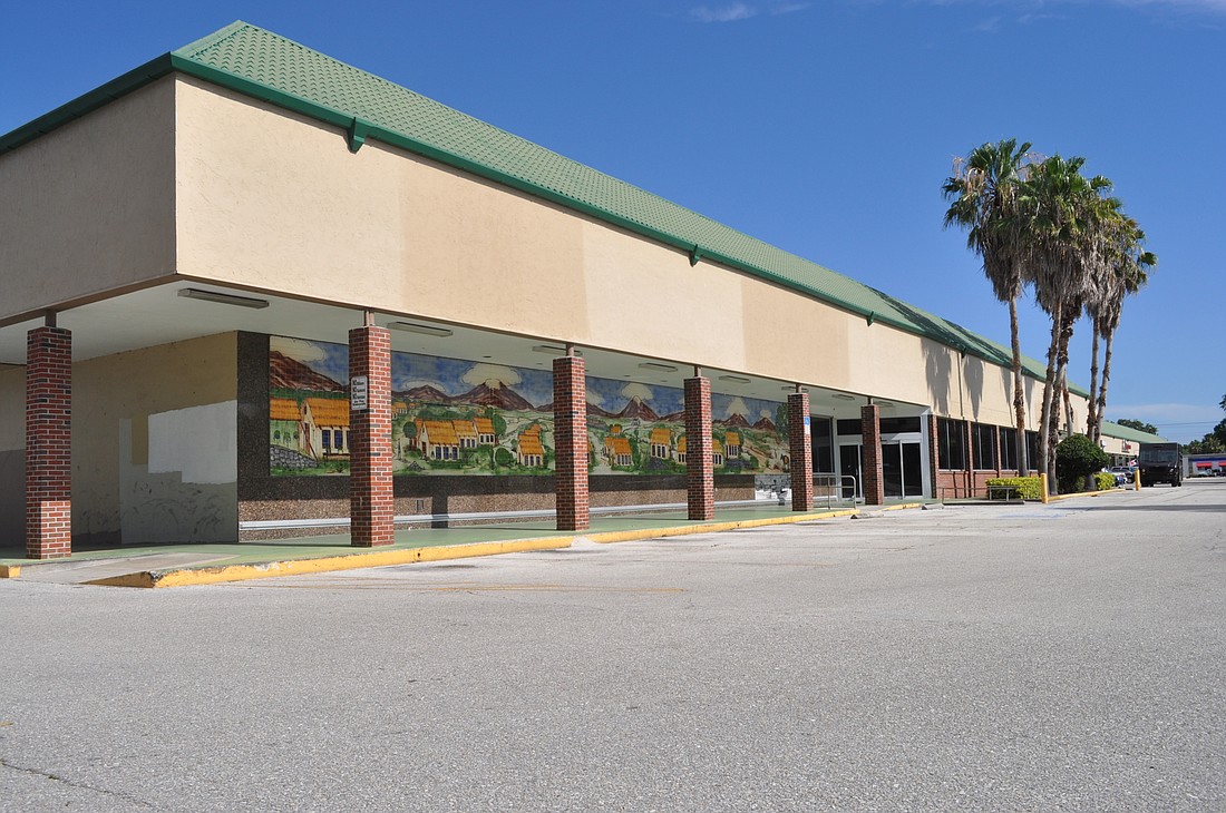 The City Commission expressed a desire to see the strip mall transformed into an "urban village."