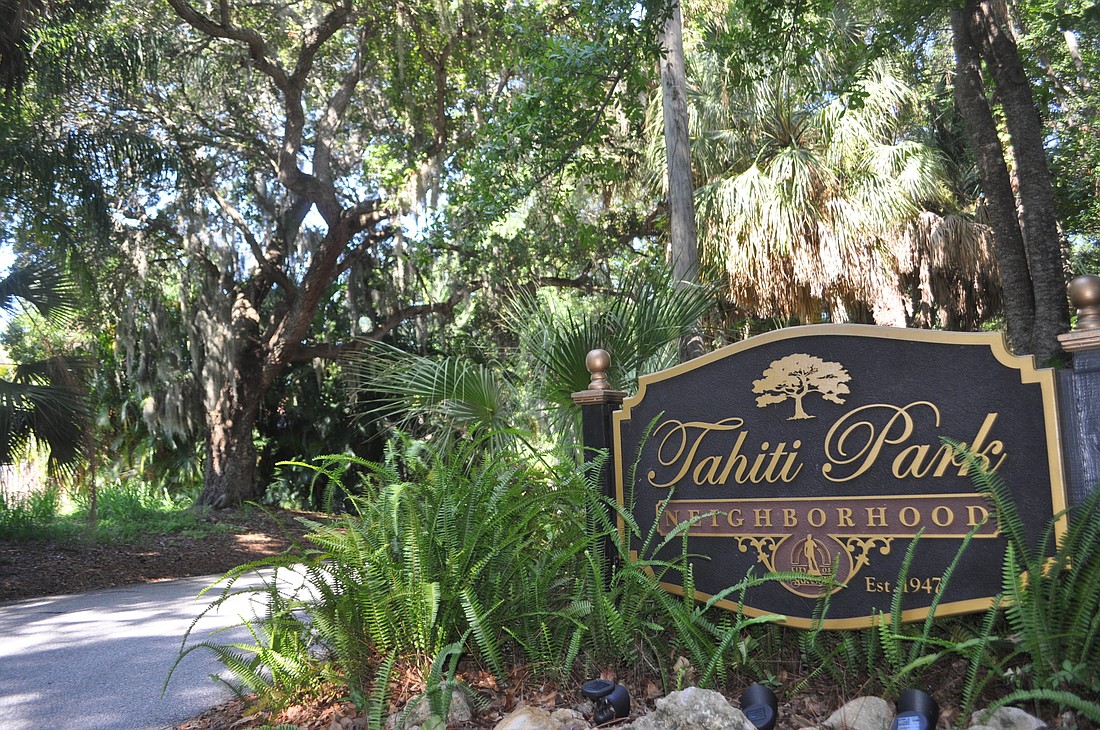 The tall trees that line Tahiti Park have sustained damage when large trucks travel down narrow streets, residents say.