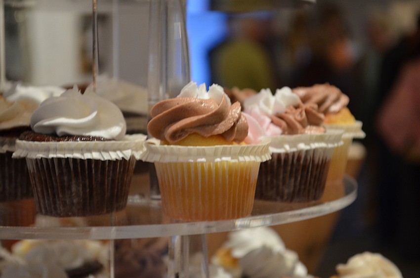 Cupcakes on display for guests provided by Cupcake A Go Go.