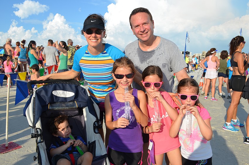 Jennifer and Glen Scharf with Andrew, Danielle Kruk, Alexa and Rachel.