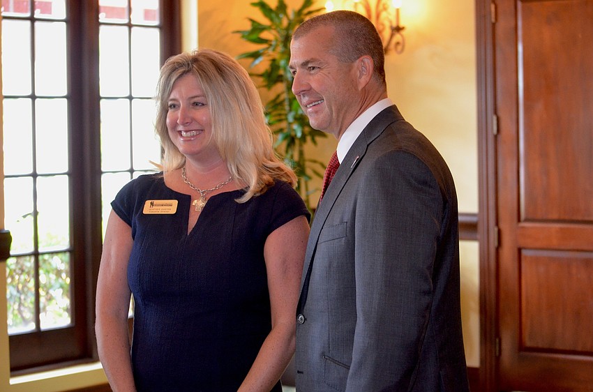 Alliance Executive Director Heather Kasten and Bucs Chief Operating Officer Brian Ford chat before Ford's presentation.