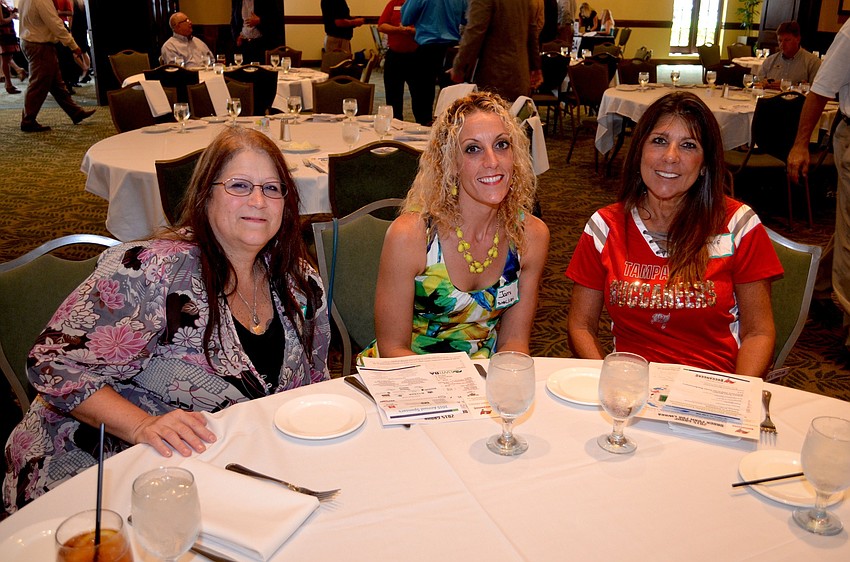 Nora Dorsett, Jami Bickhardt and Sami Mannina make new friends at the monthly event.