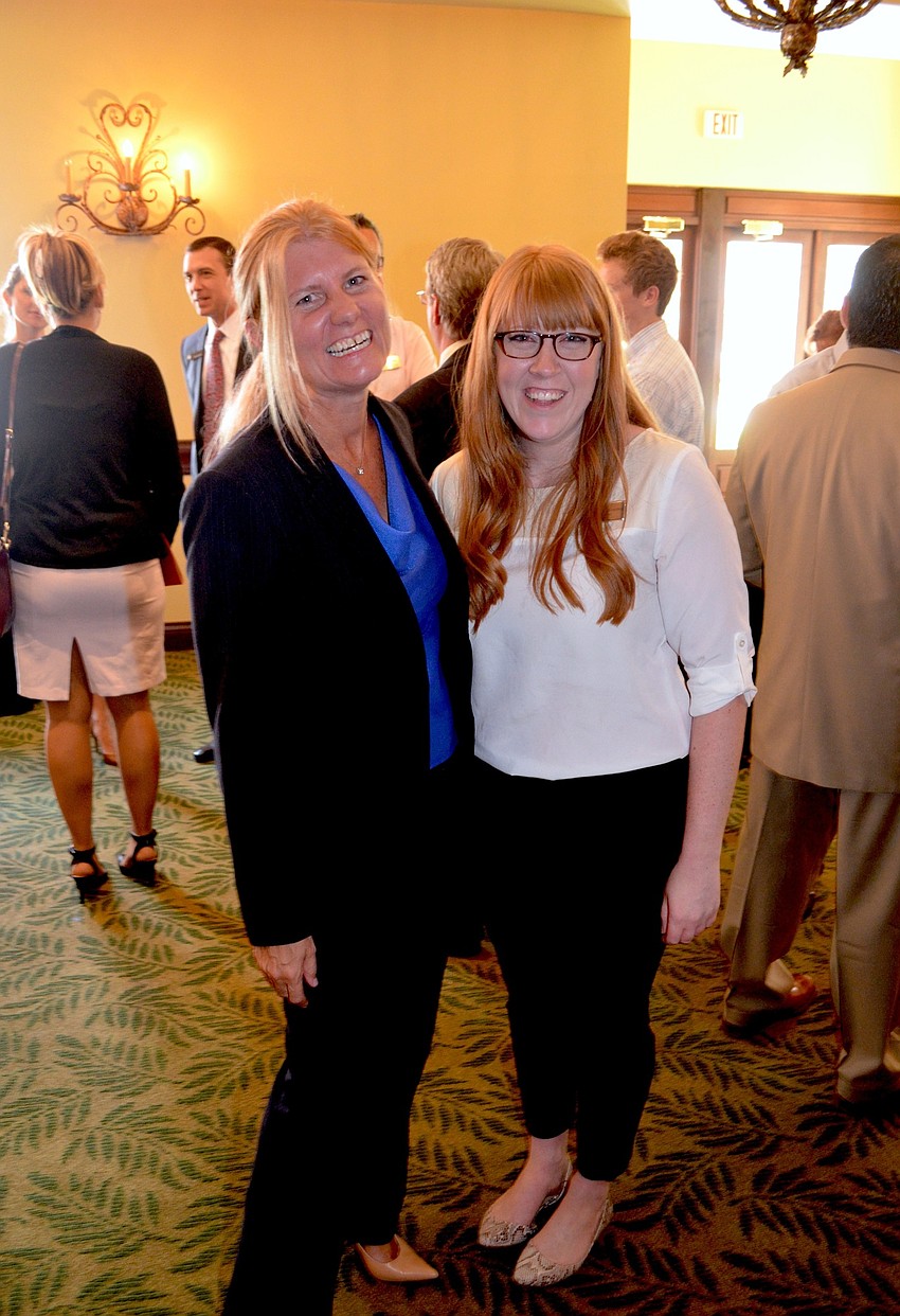 Cindy Moore and Samantha Fruchey share laughs before the event.