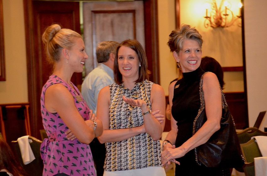 Jennifer Steube, Jennifer Rust and Sally Schule are Tampa Bay Buccaneers fans.