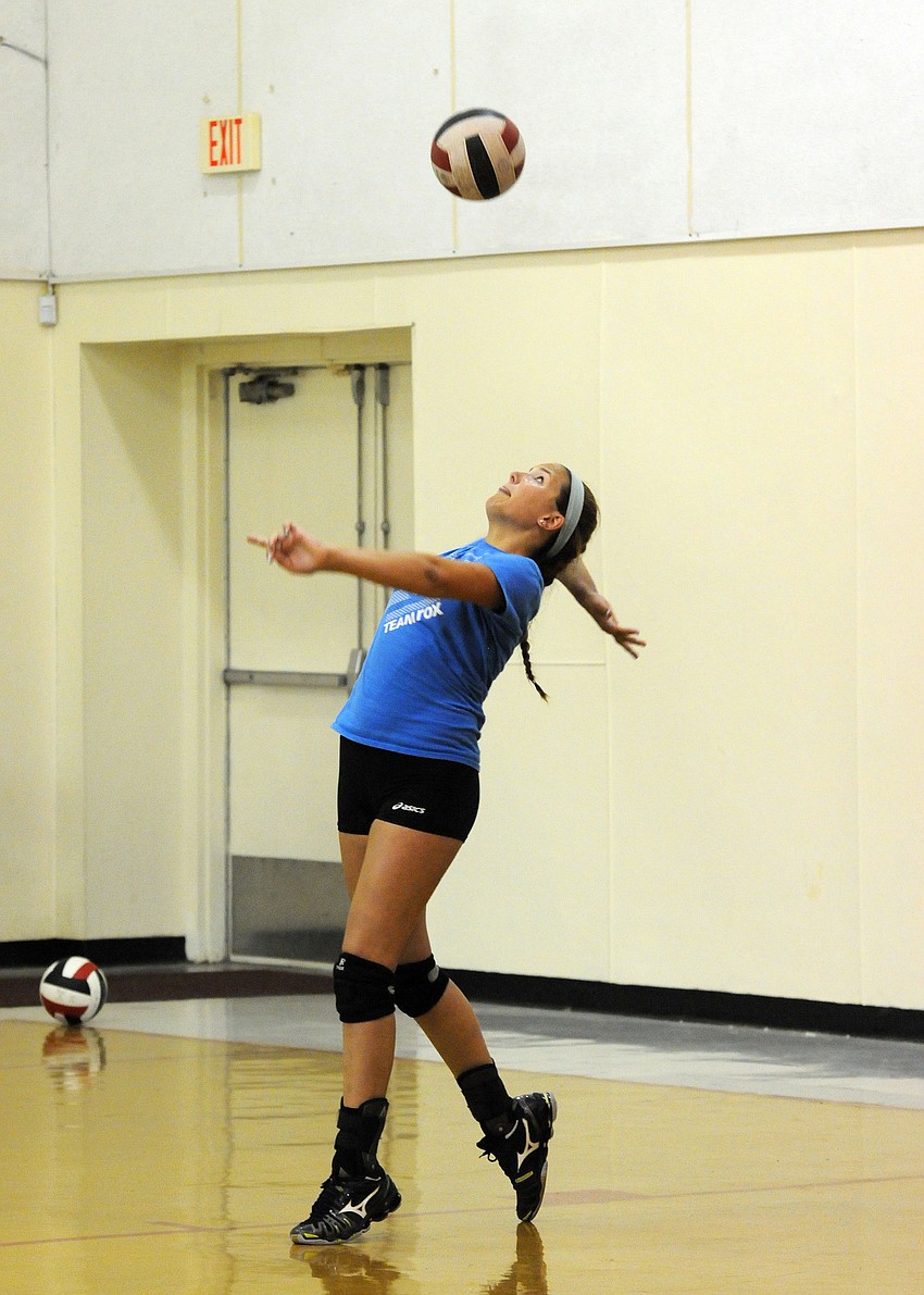 Alex McMullen serves the ball during team competition June 11.