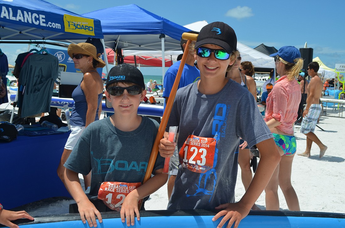 File photo. Broc and Kai Hudson competed in the 2014 Sarasota SUP Race Series.