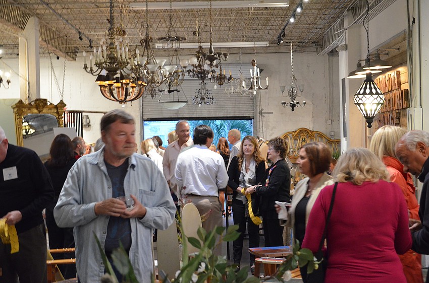 Guests roam the rooms at the Sarasota Architectural Salvage warehouse.