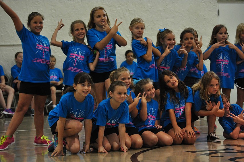 Children group together for the end of the routine.