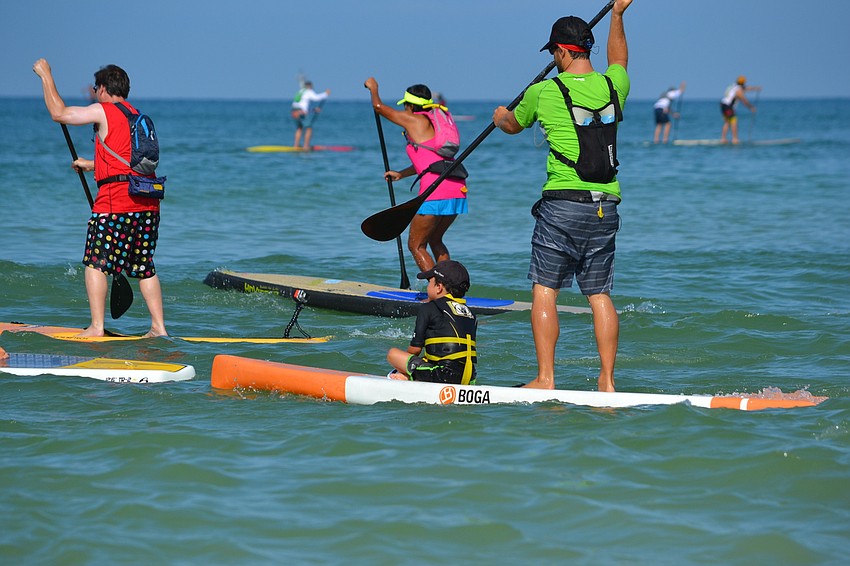 Jack Uden rides with his dad Neil during the race.
