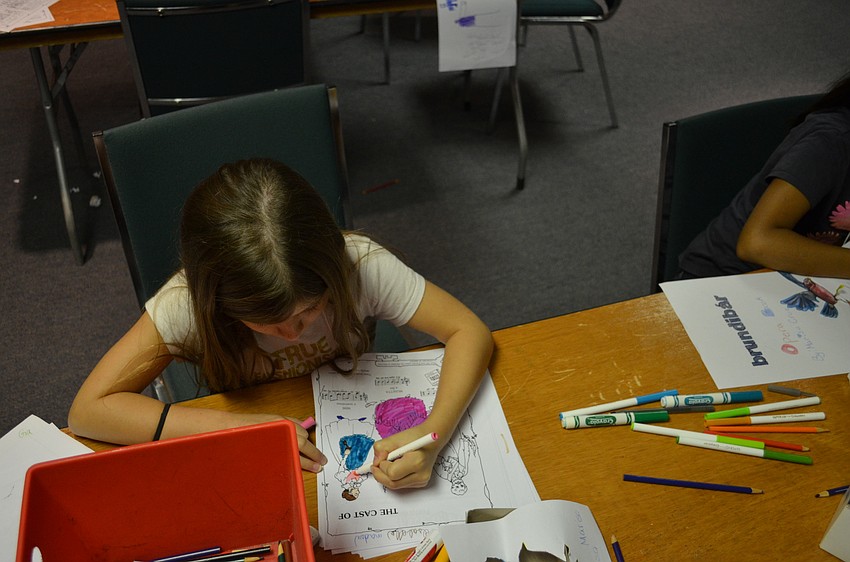 After the history and cultural lesson, students color costumes and set pieces from 