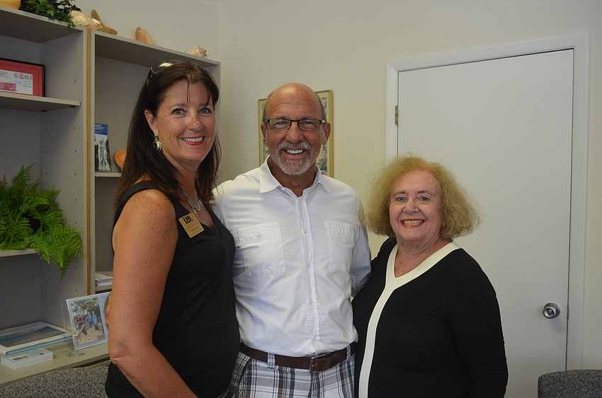 Tammy Halsted, of Florida Vacation Connection, Richard Perlman and Phyllis Ploener