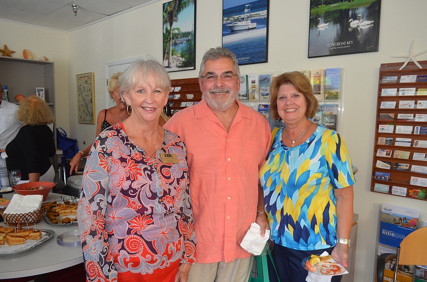 Peg Pluto, of Tommy Bahama, with Larry and Diane O’Connor