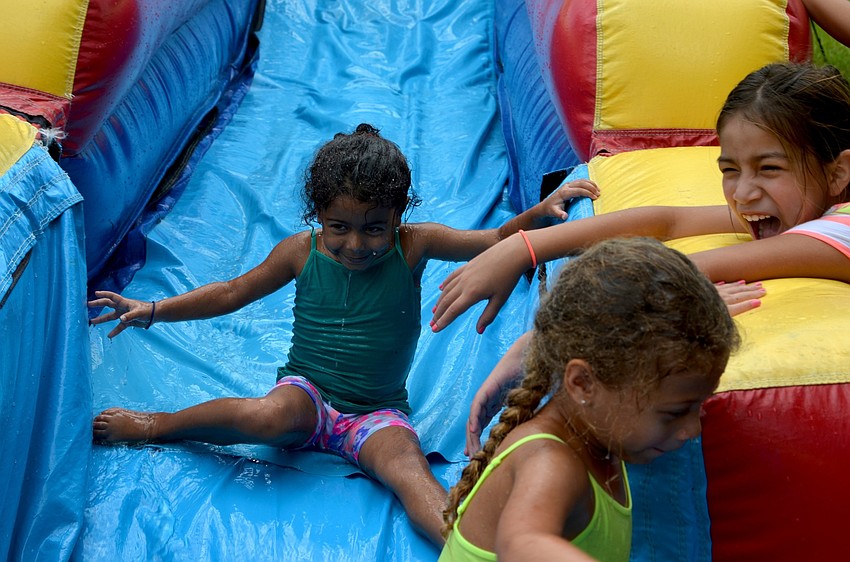 Darelyz Rivera is one of the youngest campers brave enough to conquer the biggest slide at camp.