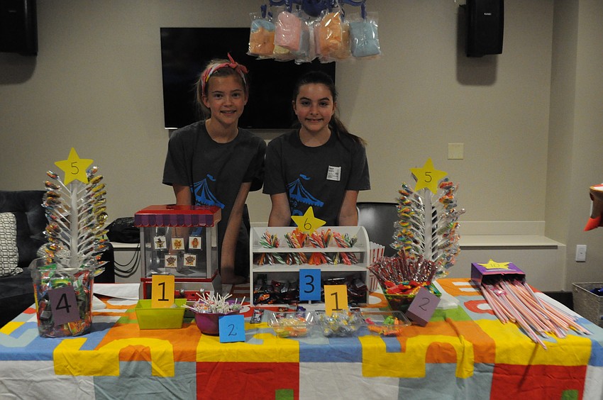 Sarah Hall and Karson Franquiero, 12, run the 