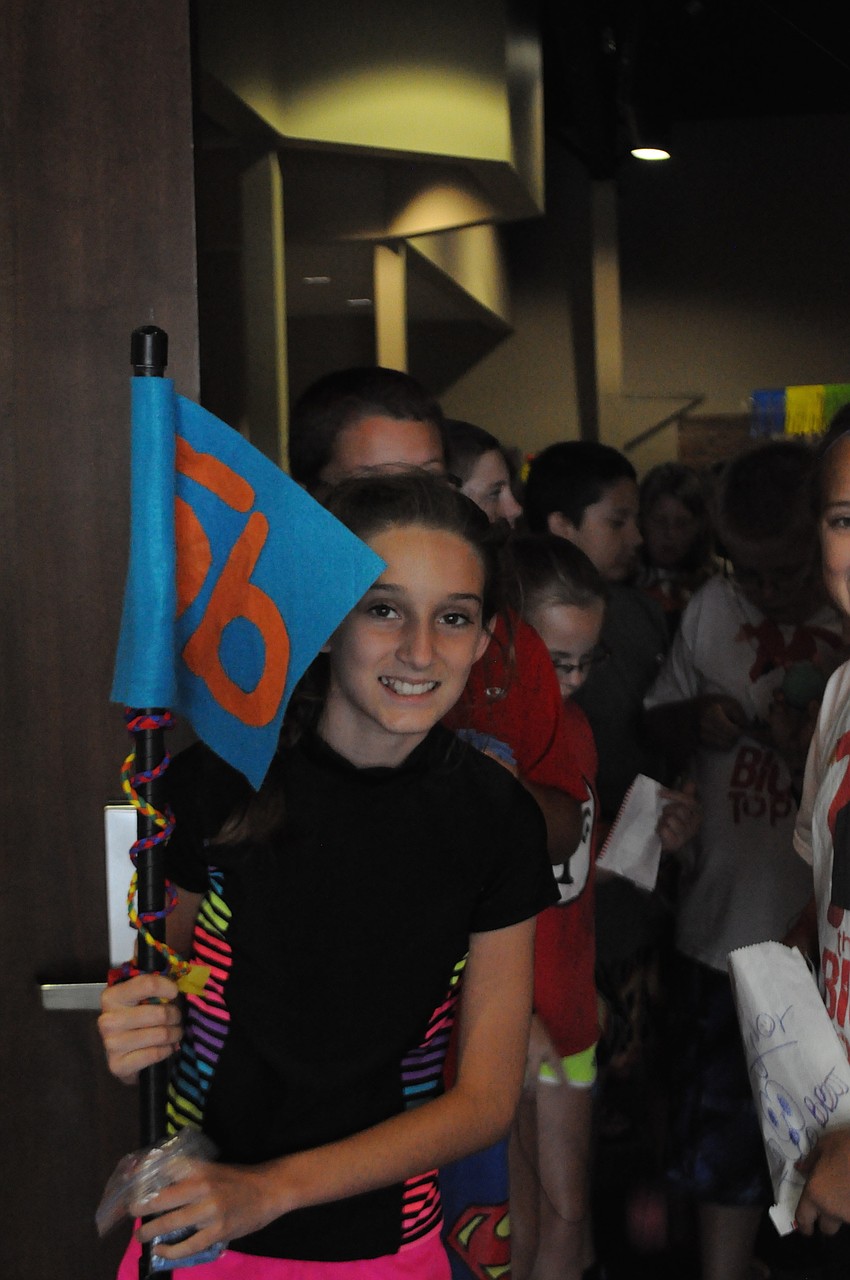 Emma Adams, 11, leads the way to the next activity.