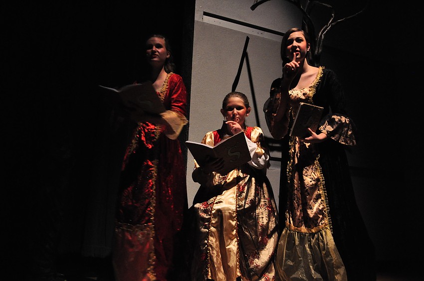 Storytellers Tatiana Galante, Jocelyn Freed and Calissa Foege set the stage for the next scene.