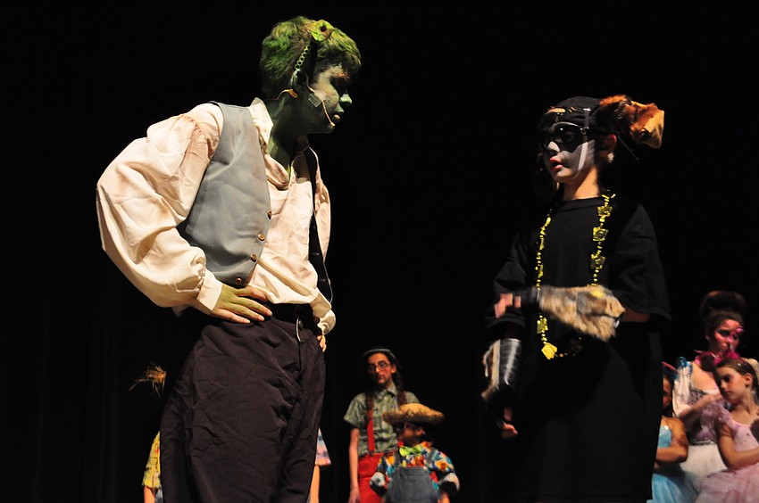 Shrek, portrayed by Jackson Helwege, laments to his sidekick, Taylor Shaklik, as Donkey, about how Princess Fiona says he's 