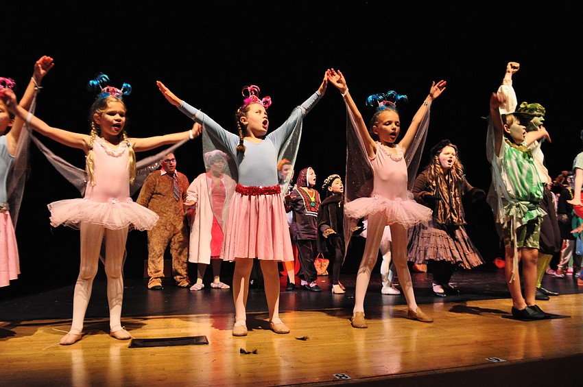 Children dance during a song about being OK with who they are as individuals.