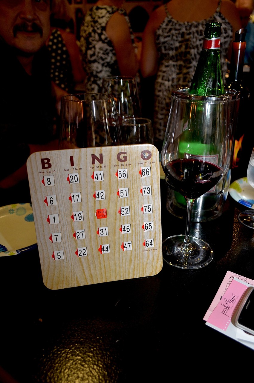 Attendees sipped wine and played bingo for the chance to win jewelry.