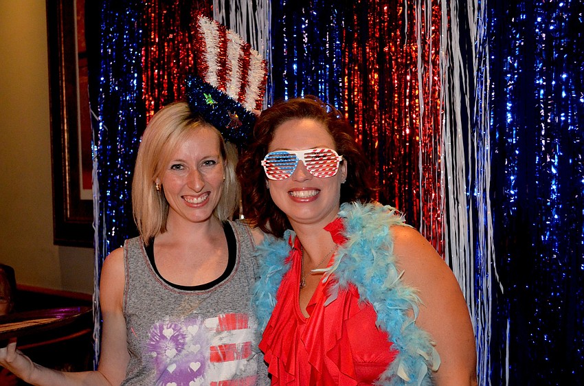 Annie Breitinger and Erin Boihem show their patriotic pride.
