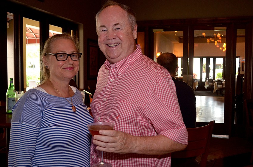 Julie and Bob Smith enjoy drinks and show support for their daughter and event co-organizer, Amanda.
