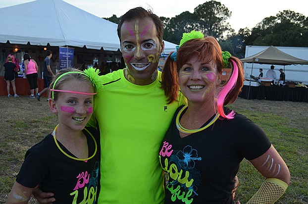 Carlos and Wendy Santos with their daughter, Eliza
