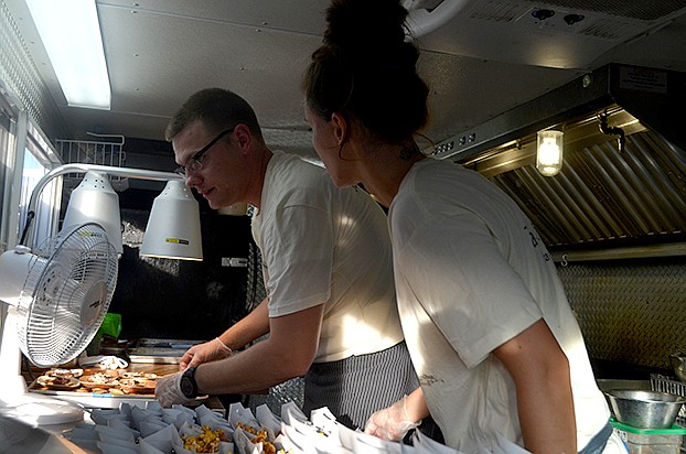 Chef Caleb Taylor preps the second course