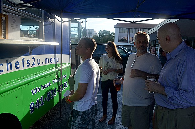 Guests line up for the first course