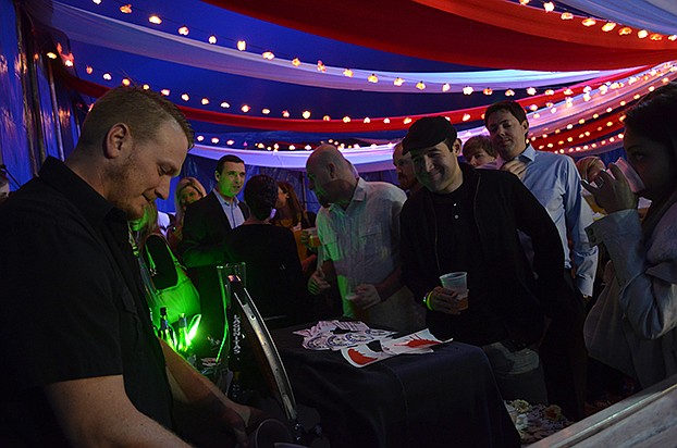 Mike Stone serves up beer for Shamrock Pub