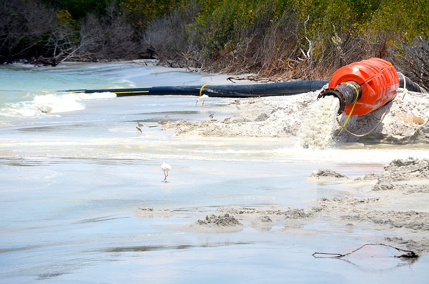 Sand will be pumped 12 hours a day, six days a week onto the north end of the Key.