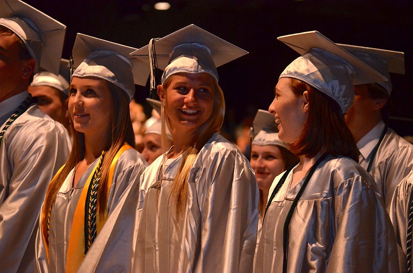 Alex Lathan and Lauren McDaniel share a laugh during the ceremony.