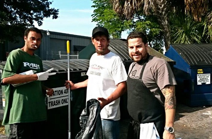 Beginning this month, Darwin's on 4th owner Darwin Santa Maria, right, has paid homeless individuals camped on nearby Kumquat Court to assist him with jobs in and around his restaurant. Courtesy photo