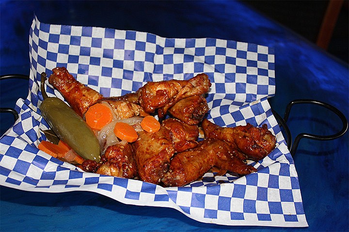 Blue Que Island Grill began as a smokehouse on Siesta Key in 2000.
