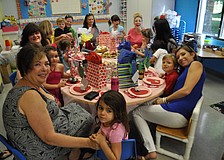 Michelle Ragni's class of 3 and 4 year olds prepare for a breakfast feast.