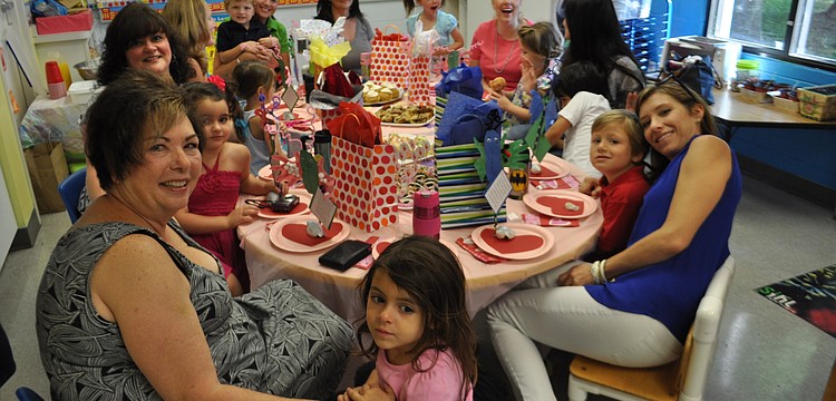 Michelle Ragni's class of 3 and 4 year olds prepare for a breakfast feast.