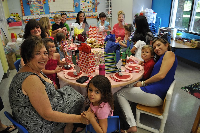 Michelle Ragni's class of 3 and 4 year olds prepare for a breakfast feast.
