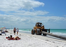 Sand should be flowing from the pipes onto the beach by Wednesday.
