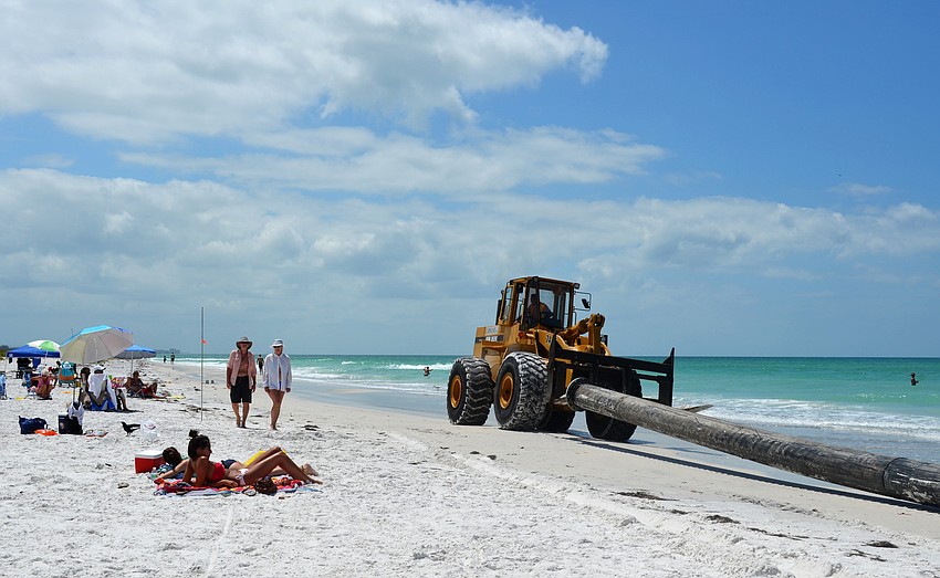 Sand should be flowing from the pipes onto the beach by Wednesday.