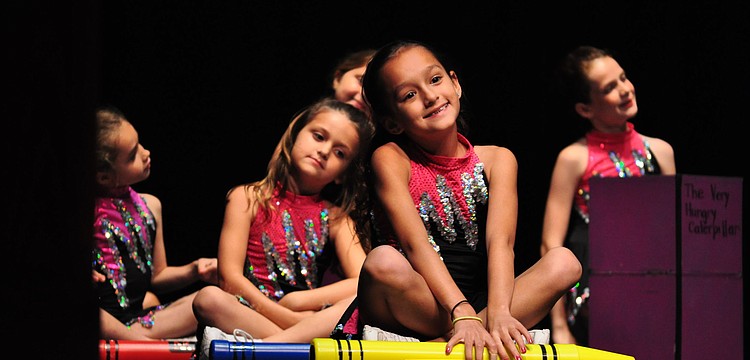 Tara's Â Samantha Hix, front, is all smiles during the "ABC" song.