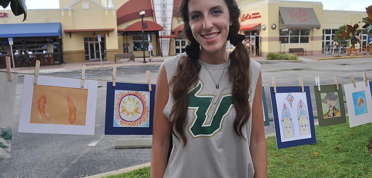 Sydney Anderson, a junior, painted with watercolor.