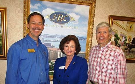 Steve Roskamp, partner in Sarasota Bay Club, with Donna Dunio and Dick Pelton, of Longboat Island Chapel (Courtesy)