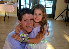 Bob Webber enjoys an evening with his daughter, Chiana.