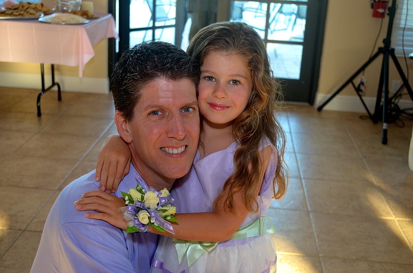 Bob Webber enjoys an evening with his daughter, Chiana.