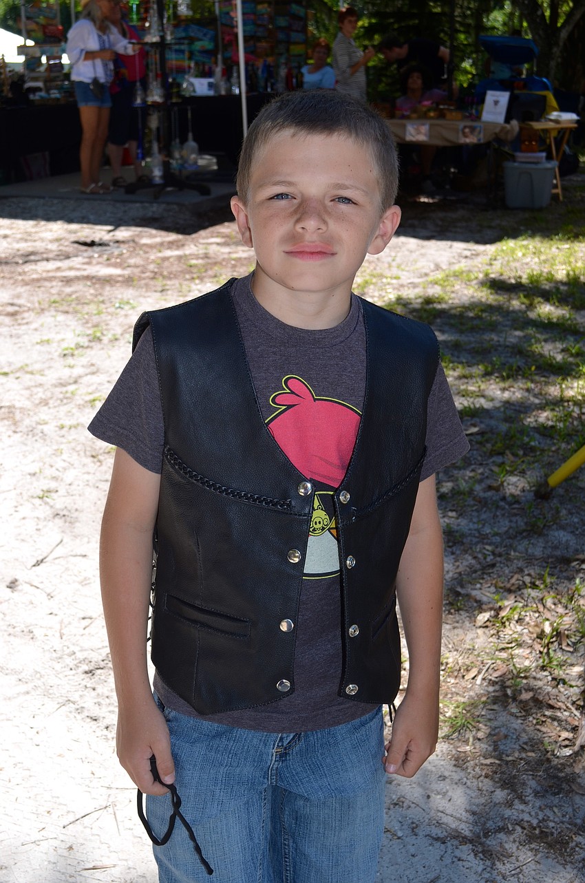 Joey Davis shows off his leather vest.
